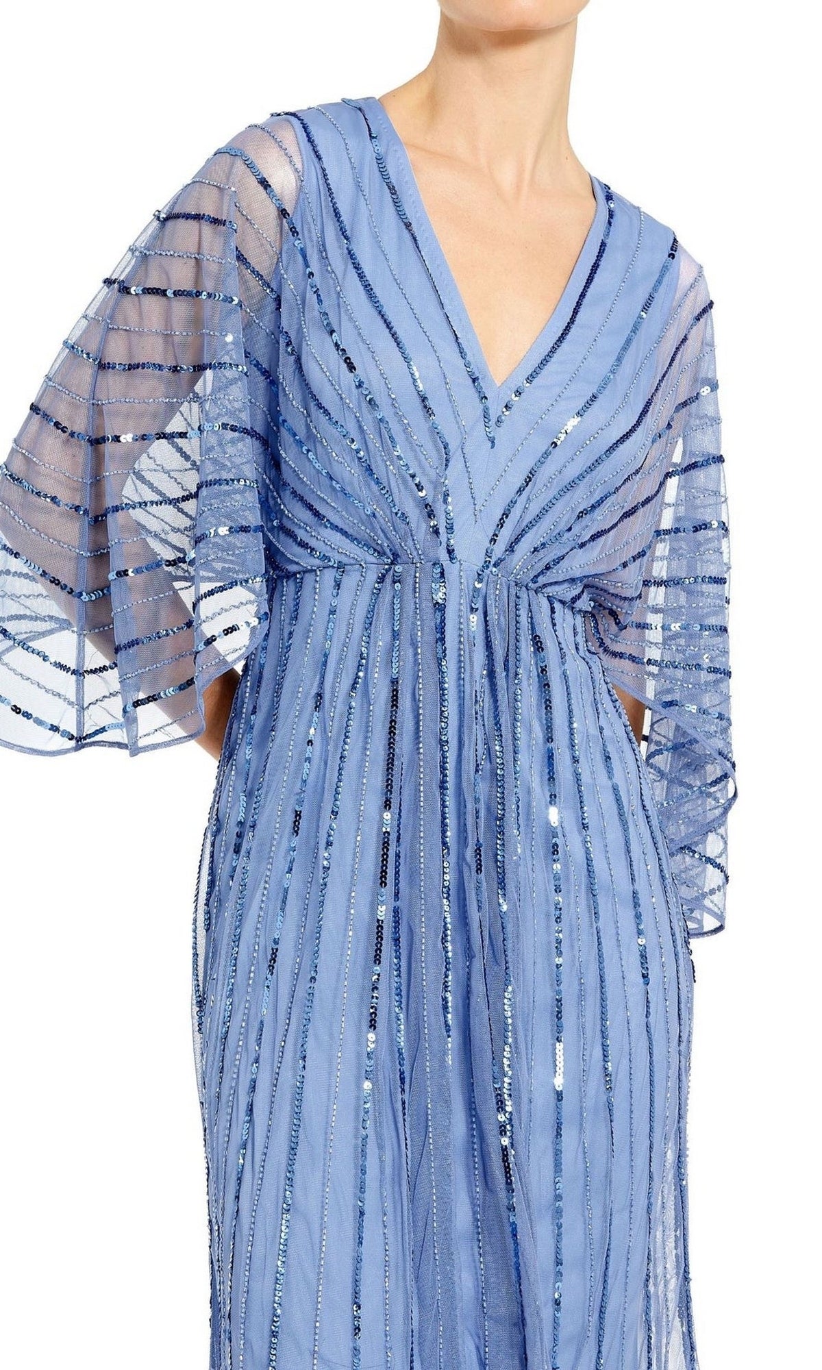 A person wearing the Mac Duggal Periwinkle Blue Sequin Formal Dress 93995 with kimono sleeves and vertical sparkly sequin stripes.